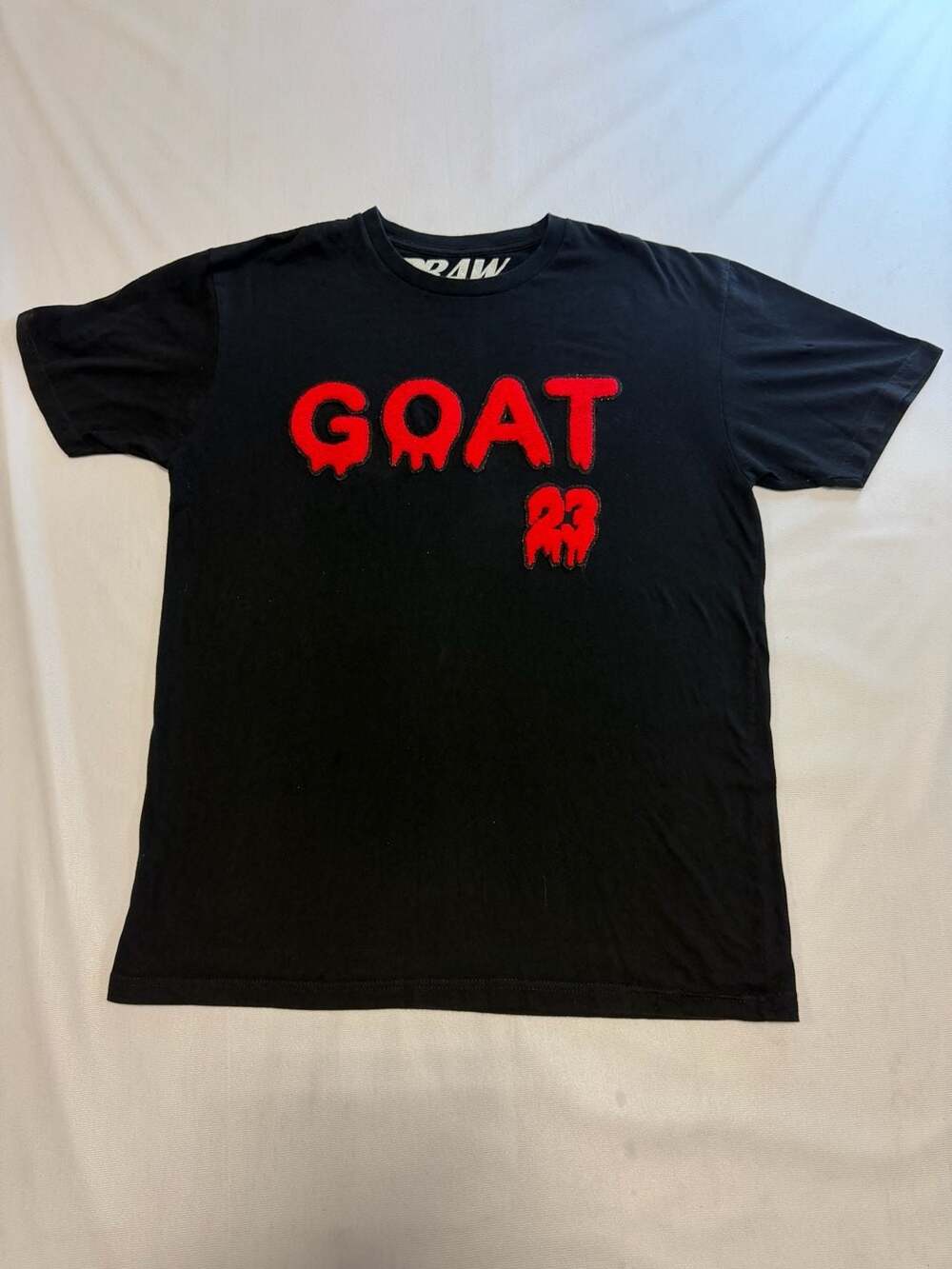Rawalty Own The Now GOAT 23 Red Chenille Patch Black T-Shirt